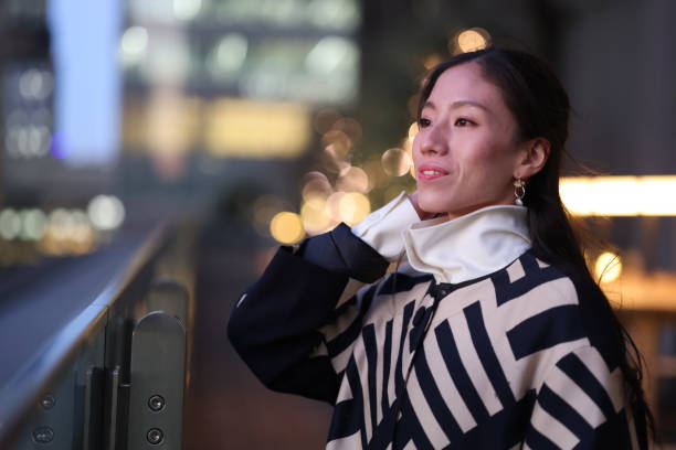 istock Beautiful young lady enjoying cityscape in dawn 1371663757