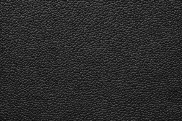 istock Natural texture of black leather. Dark abstract background 1371667571