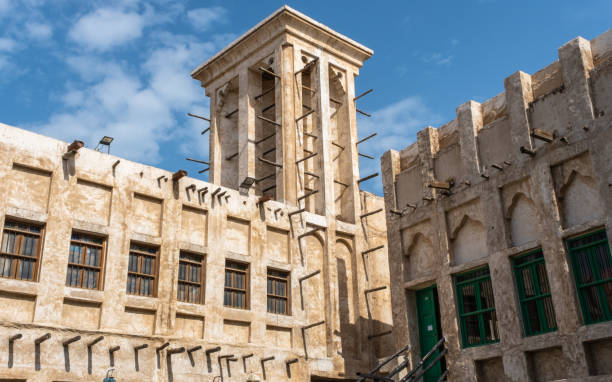 Tower in Souq Waqif with traditional middle eastern qatari architecture stock photo