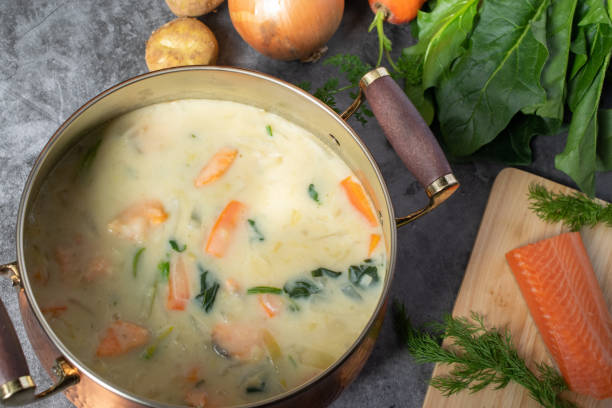istock Salmon and spinach cream stew and its ingredients on the table 1371670656
