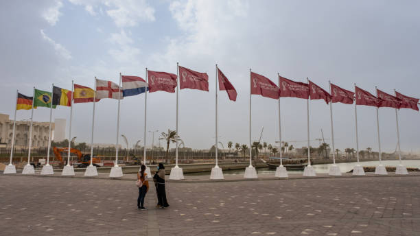 Doha, Qatar - January 15th 2022: Fifa World Cup 2022 Qatar Flags flying at the Corniche Promenade, Doha, Qatar