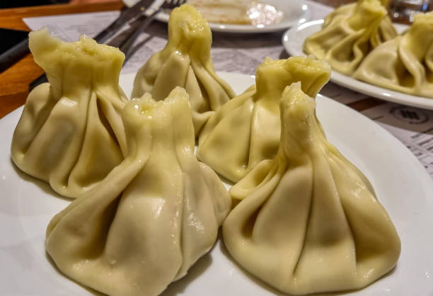 istock Tbilisi - Georgian dumplings Khinkali with meat 1371673830