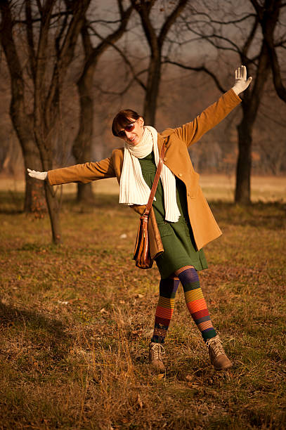 istock Woman with spread hands on autumn day 137167741