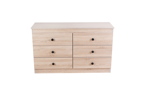 New light closed chest of drawers isolated on white background