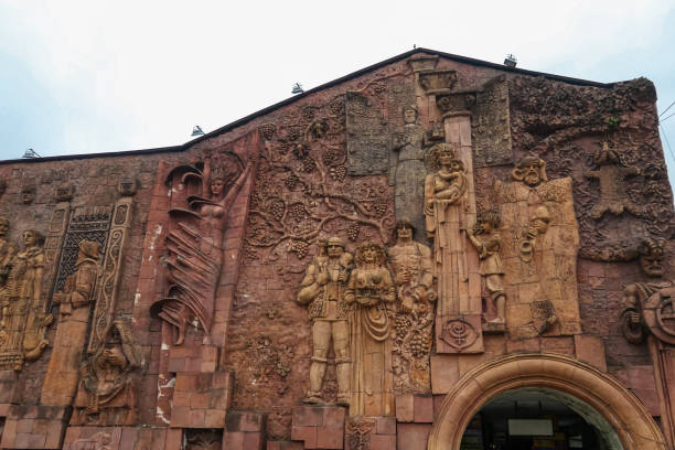 KUTAISI, GEORGIA - August 18, 2021:Detail of the Soviet-era relief on wall of city market in Kutaisi, Georgia. Mosaics and wall sculptures were popular