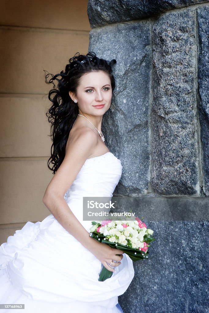 Sourire et stone - Photo de A la mode libre de droits