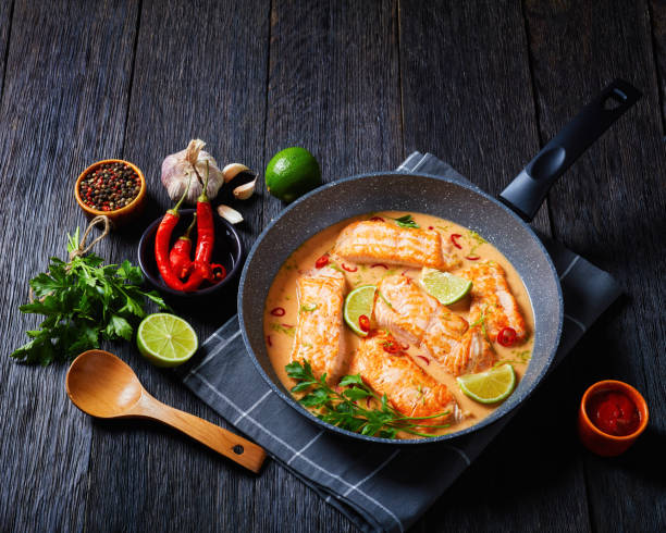 istock Poached Salmon in hot Coconut Lime Sauce 1371691570