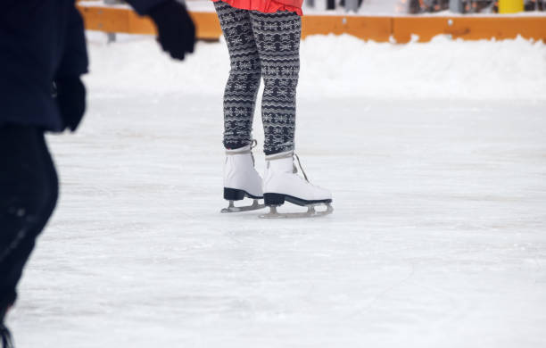 istock legs of people skating closeup 1371691640