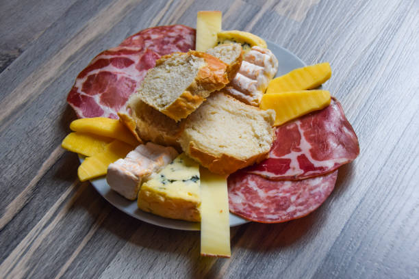 istock antipasti cheese board plate of bread bresaola comte 1371694136