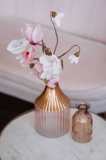 istock Pink flowers in a vase on the table 3645. 1371695744