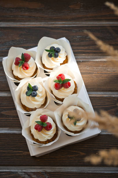 istock Cardboard stand with cream cakes and berries 3625. 1371696961