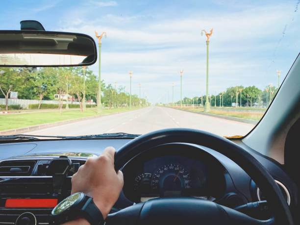 istock driving on the road, drivers point of view.