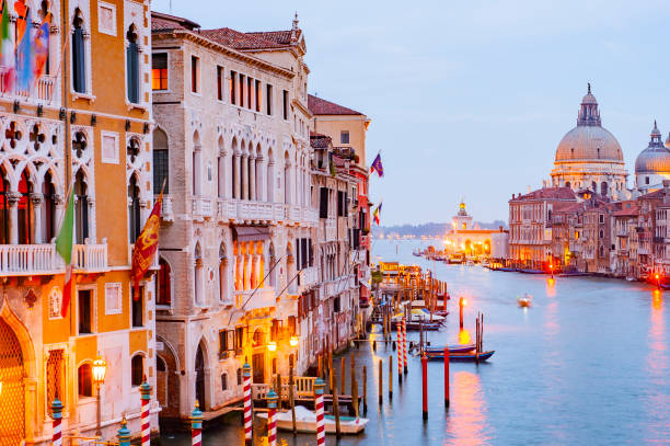The Basilica Santa Maria della Salute and the Grand Canal, Venice, Italy. stock photo
