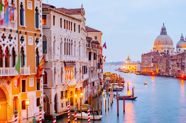 Photo of The Basilica Santa Maria della Salute and the Grand Canal, Venice, Italy.