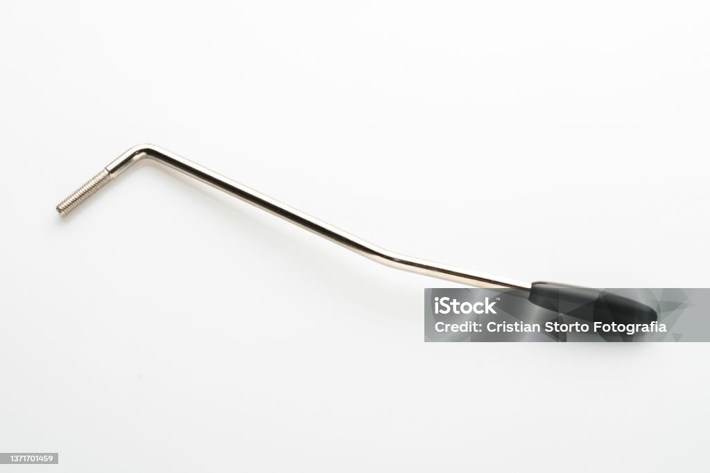 Whammy bar (tremolo) for electric guitar on white background Bending Stock Photo