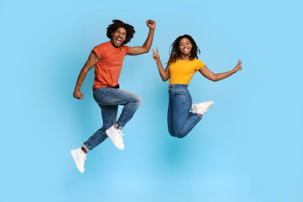 istock Carefree black lovers having fun on blue studio background 1371701519