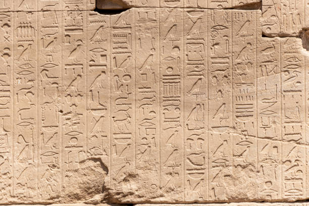 istock Relief details and Egyptian hieroglyphs at Karnak temple 1371701842