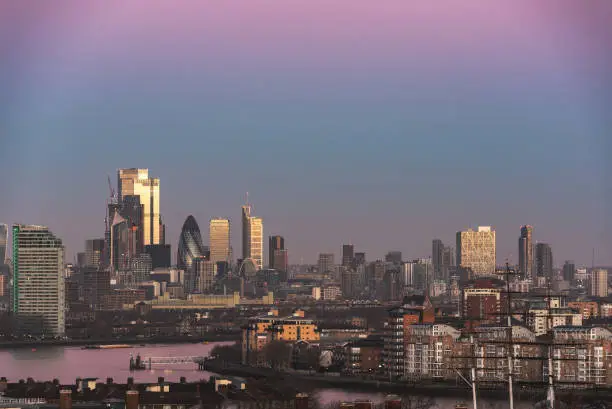 LONDON, JANUARY 30, 2022 - Stunning sunrise view of City Square Mile in London at sunrise with beautful soft light and all landmark building visible