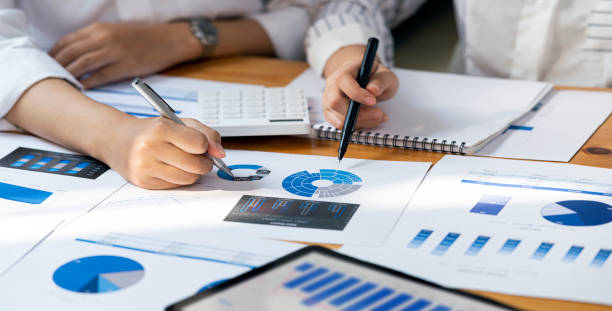 istock Professional business partner consulting the strategy. Working on graph chart business information. 1371705335