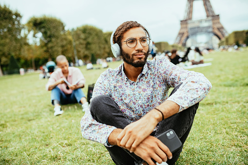 Portrait of multiracial person in Paris with perfect smile