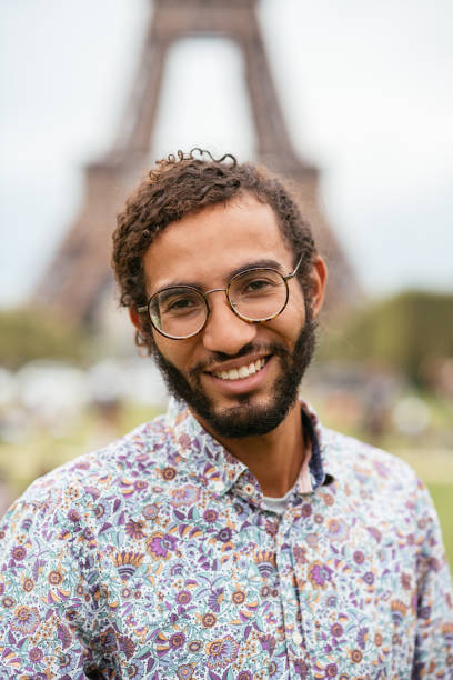 istock Handsome mixed race man looking at camera and smiling 1371706870