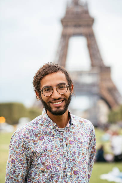 istock Handsome mixed race man looking at camera and smiling 1371707476