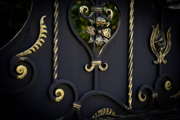 istock Modern decorative forged elements of a metal fence 1371708016