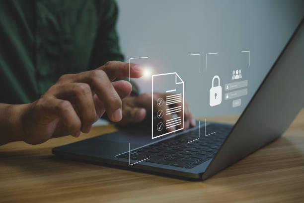 istock Businessmen protecting personal data on laptop and virtual interfaces 1371712598