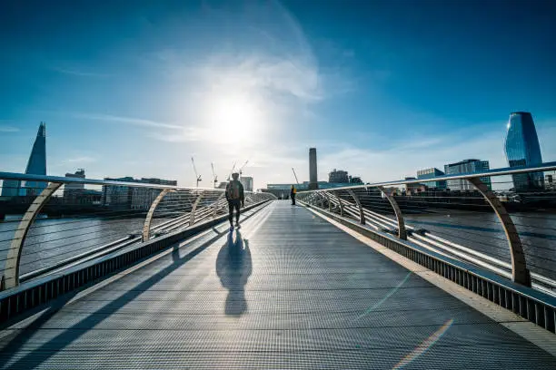 Photo of People Walking On Millenium Bridge, London
