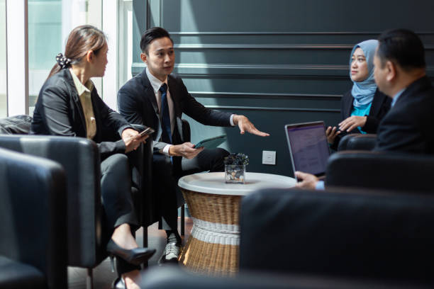 istock Group of business man having discussion 1371716127