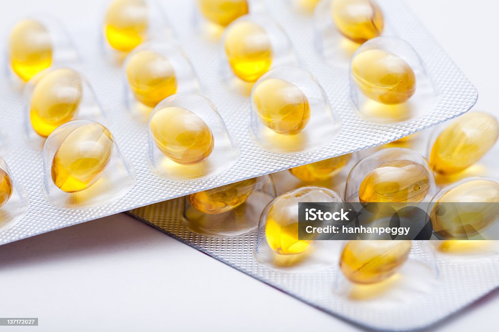 Cápsulas de vitamina E - Foto de stock de Aceite de hígado de pescado libre de derechos