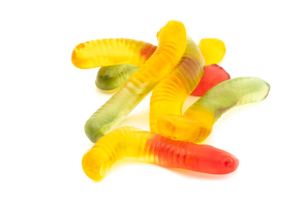 istock Colorful Fruity Gummy Worm Candy isolated on white background. 1371720827