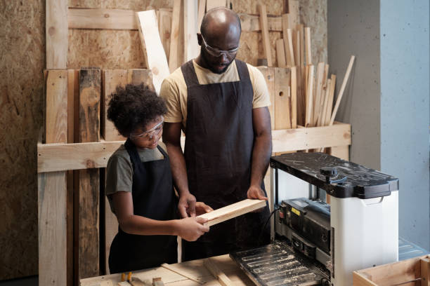 istock Father and Son Bonding in Workshop Together 1371721578