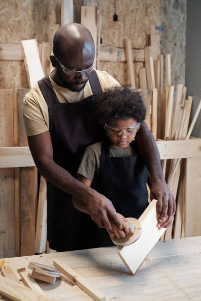 istock Father and Son Crafting Together 1371721585