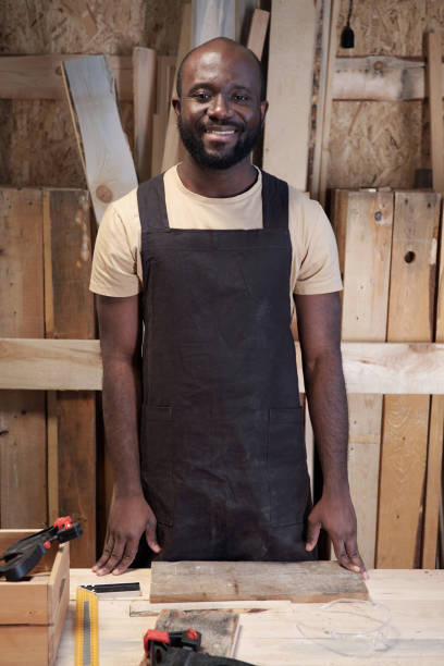 istock Male Artisan Posing in Workshop 1371721644