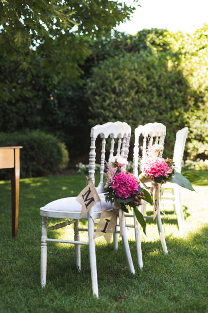 istock Bride and Groom Chairs at wedding reception 1371721707