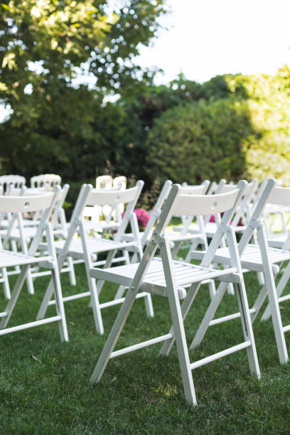 istock White garden chairs at wedding 1371721760