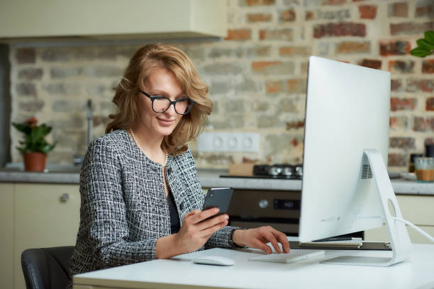 istock A woman working on a desktop computer with her employees at a video conference. 1371723074