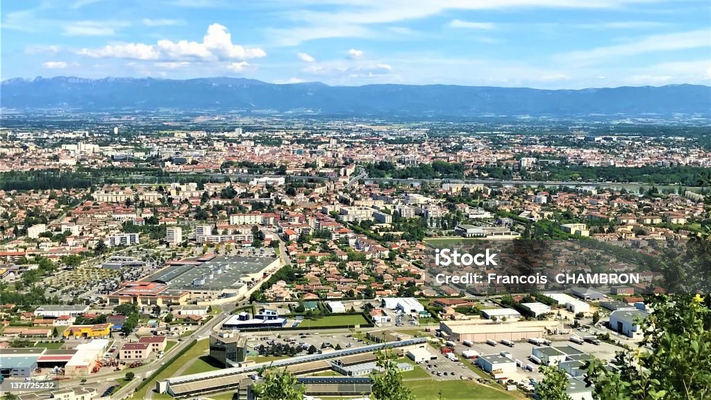 Aerial Panorama of Valence Drôme in France with Rhone River and Alps mountains in the background Aerial Panorama of Valence Drôme in France with Rhone River Valley and Alps mountains in the background on a beuatiful sunny sky Valence - Drôme Stock Photo