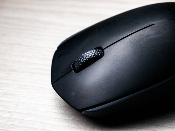 istock shiny black wireless mouse with a roller in the middle 1371730168