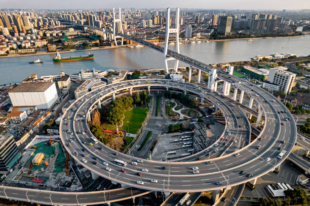 ponte nanpu, xangai - rio huangpu - fotografias e filmes do acervo