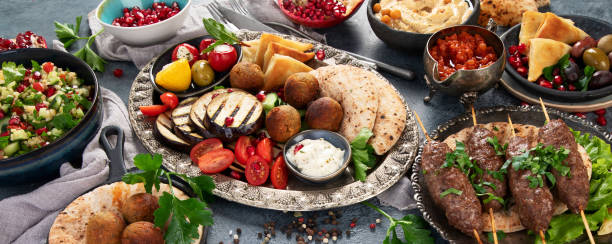 istock Arabic food assortment on dark background. 1371731034