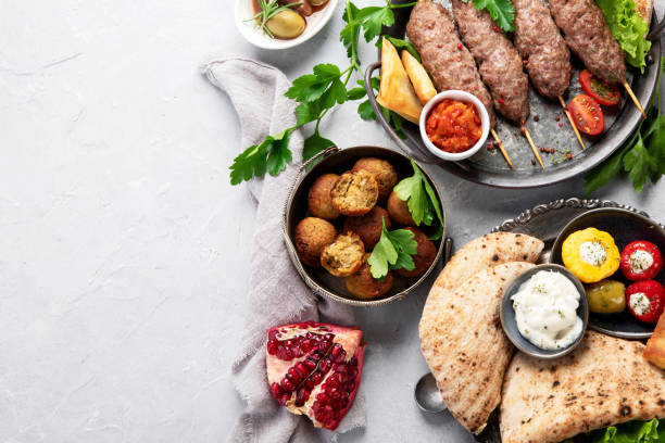 istock Lebanese food assortment on light background. 1371731035