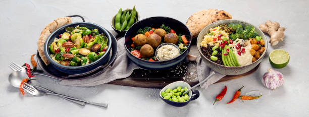 istock Vegan dishes assortment on light background. 1371732174