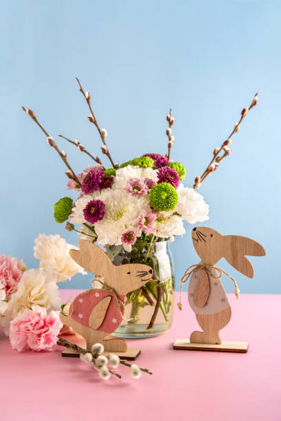 istock Happy Easter concept. Congratulatory Easter background. Easter bunny and flowers. Easter Card 1371734763
