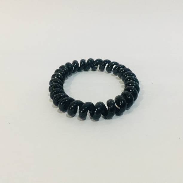 istock Black elastic rubber bracelet with crooked shape. 1371734810
