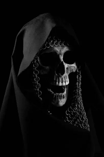 Skull with chainmail bonnet and black hood