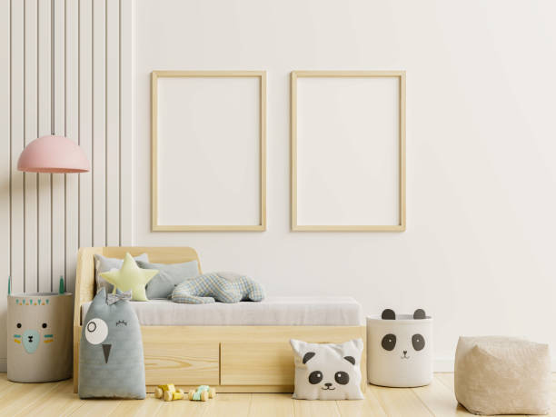 istock Frame poster mockup in children room interior on empty white wall background. 1371740349