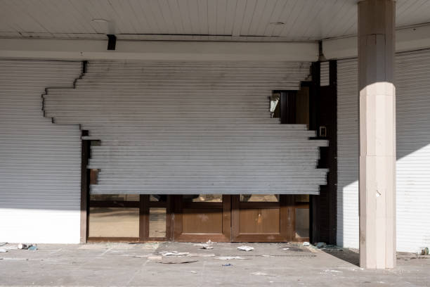 istock Broken rolling shutter due to burglary or vandalism. 1371741454
