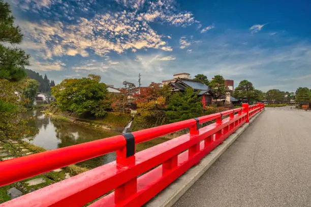 Takayama Gifu Japan, city skyline at Nakabashi red bridge and Miyagawa river in autumn season